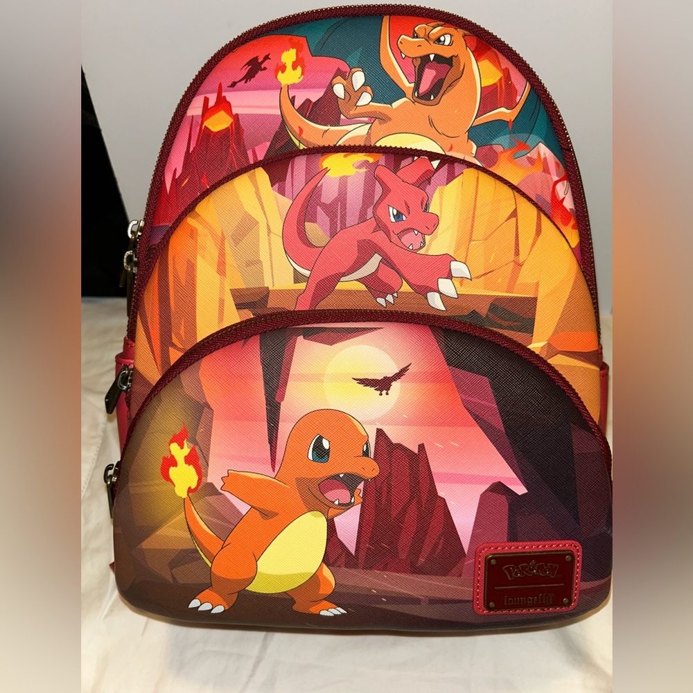NWT 3 pocket Pokemon Charizard Evolutions Loungefly backpack.
